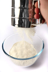 Image showing Sifting white flour