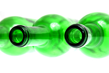 Image showing Detail of empty green glass wine bottles