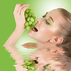 Image showing girl with grapes