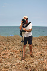 Image showing Camera Man on Shoreline