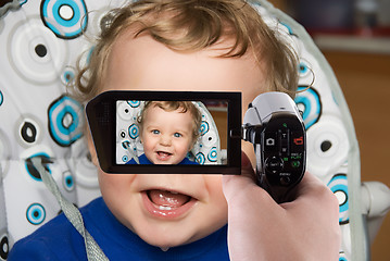 Image showing baby boy to camcorder