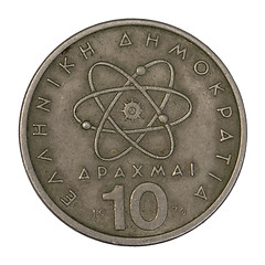 Image showing scientific model of atom on old Greek coin