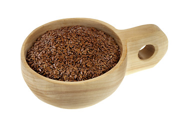 Image showing scoop of brown flax seeds