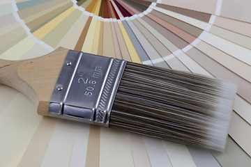Image showing paintbrush and paint color swatches
