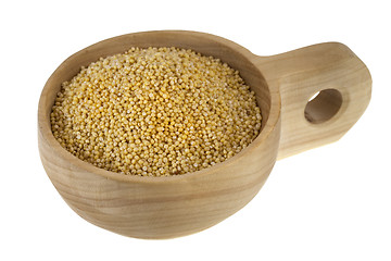 Image showing scoop of hulled millet grain