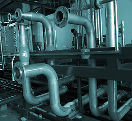 Image showing Installation of industrial pipelines in blue tones