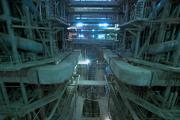 Image showing Equipment, cables and piping as found inside of a modern industr