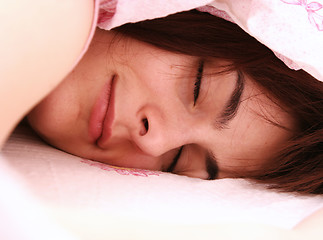 Image showing Beautiful young woman sleeping.