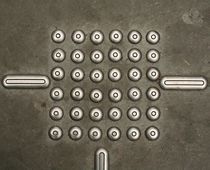 Image showing Thirty-six metal dots