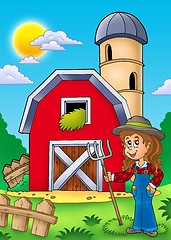 Image showing Big red barn with farmer girl