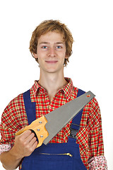 Image showing Carpenter with handsaw