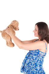 Image showing Portrait of pretty pregnant woman with toy