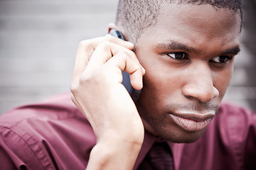 Image showing Black businessman on the phone