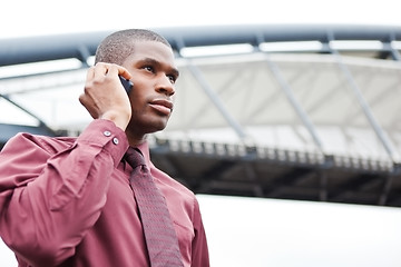 Image showing Black businessman on the phone