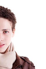 Image showing half face of portrait of a handsome young man,with winter clothes