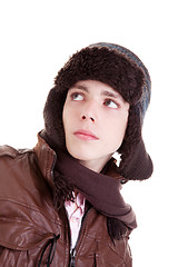 Image showing Young boy looking serious, with hat and winter clothes