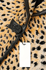 Image showing Blank label on a stylish leopard jacket