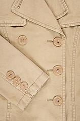 Image showing Closeup of coat with buttons