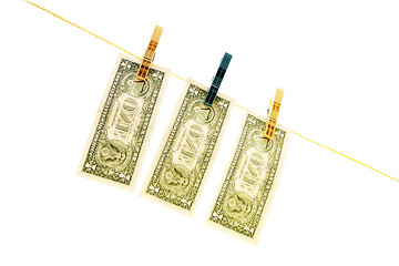 Image showing Dollars on the wire