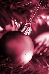 Image showing Christmas ornaments on tree.