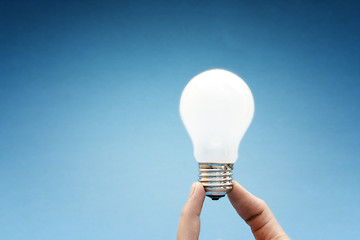 Image showing Background with lit lightbulb