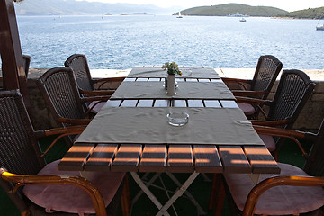 Image showing table in open air restaurant on sea resort