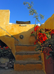 Image showing Colorful orange stairs. Santorini, Greece