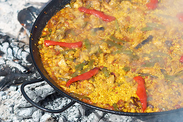 Image showing Traditional paella cooking