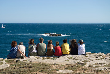 Image showing Group of people sitting on beach