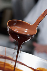 Image showing Pouring chocolate