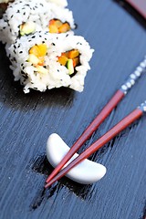 Image showing chopsticks sushi