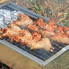 Image showing BBQ. Close up photo of cooking meet on the open fire