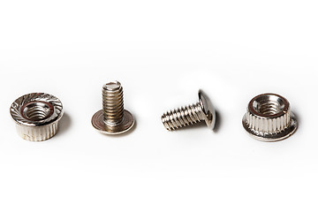 Image showing Many screws and nuts isolated on white background