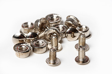 Image showing Many screws and nuts isolated on white background