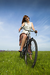 Image showing Girl with a bicycle