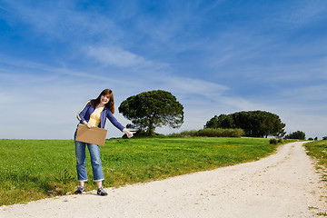 Image showing Hitch hiking girl