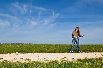 Image showing Hitch hiking girl