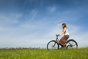 Image showing Riding a bicycle