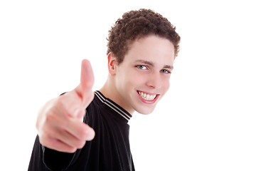 Image showing young man smiling, with thumb up