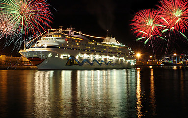 Image showing Cruise boat at night with fireworks