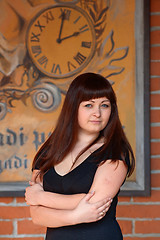 Image showing Beauty woman at retro poster with clock.