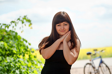 Image showing Beauty woman with bicycle