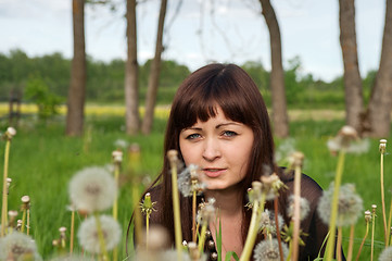 Image showing Beauty girl in meadow.