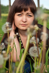 Image showing Portrait of beauty girl with dandelions.
