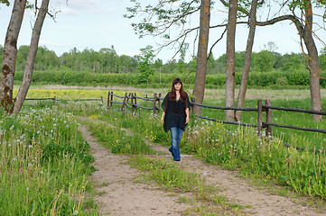 Image showing Walk near by dandelion meadow.