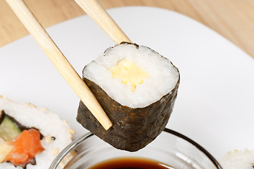 Image showing Eating sushi