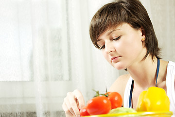 Image showing Housewife at window