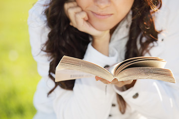 Image showing Book in hands of woman