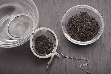 Image showing Still life with black tea leaves