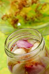 Image showing Red and white onions in jar